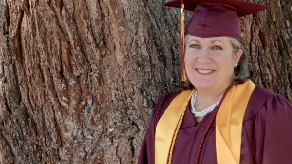 portrait of student in cap and gown