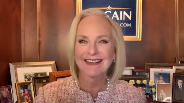 screenshot of Cindy McCain smiling at camera in Zoom meeting