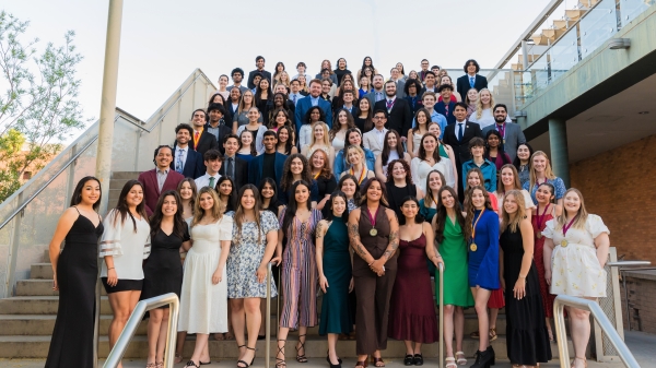 Group of Medallion Scholars posing together on a staircase outside.