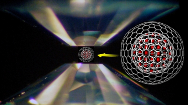 Pair of diamonds used to squeeze a spherical carbon container