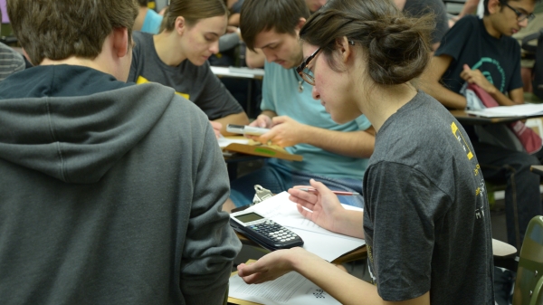 Students dig in to solve their first cipher during Cryptorally 2017