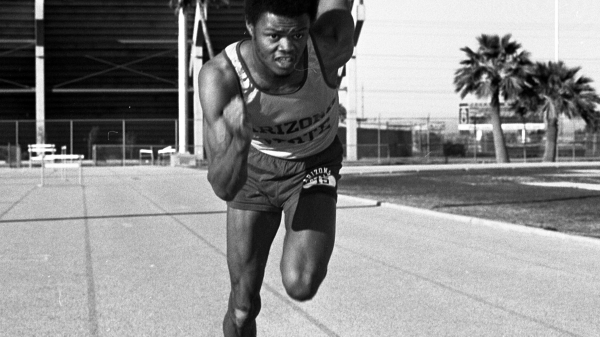 vintage photo of man sprinting
