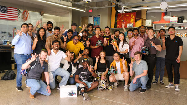 A group of people pose for a photo.