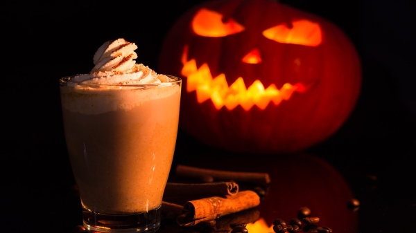 Jack-o-lantern and a pumpkin spice latte.