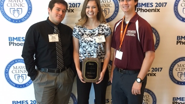 Student organization leaders stand with their Commendable Achievement Award