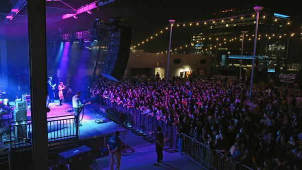 Japanese Breakfast on stage at the Coca-Cola Sun Deck, performing for a nearly sold out show. 