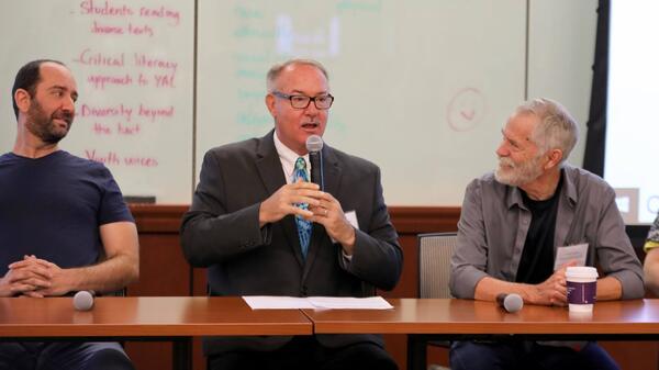 Bill Konigsberg, James Blasingame, and author Chris Crutcher on a panel at the 2018 YA Summit / Photo by Noah Schaffer