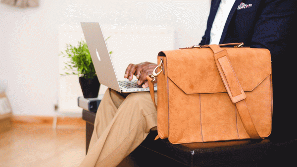 Man typing on laptop