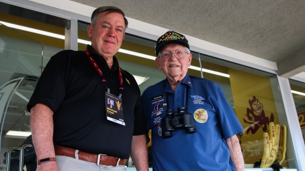 ASU President Michael Crow invites veteran and alumnus Jerry Gustafson to a Sun Devils football game during Salute to Service 
