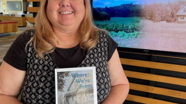 Woman holding book