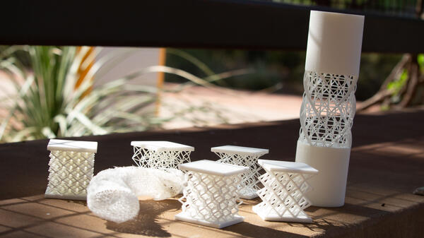 A collection of 3D-printed structures on a table.