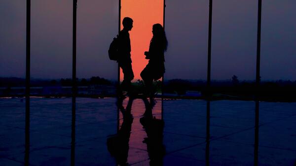 A silhouette of a couple.