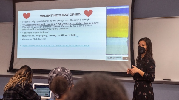 ASU Assistant Professor Thao Ha stands at the front of a classroom.