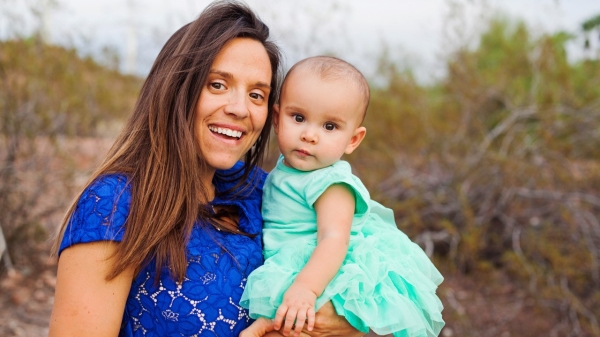 ASU graduate Paulette Stevenson with her daughter, Josephine. / Photo: Hillarie Mae Photography