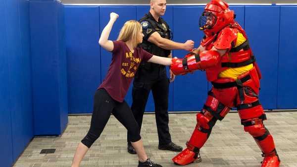 Photo of ASU Police officer and participant in women&#039;s self-defense course