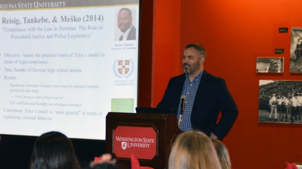 Criminal Justice professor Michael Reisig delivers the keynote address during an alumni awards ceremony