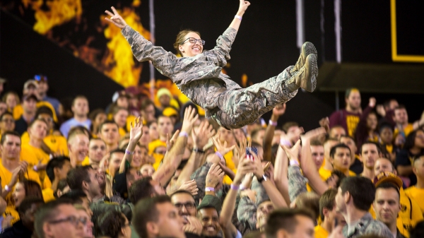 Soldier having fun at a football game