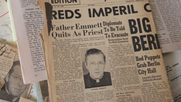 Photo of an old newspaper announcing Emmett McLoughlin had quit the priesthood