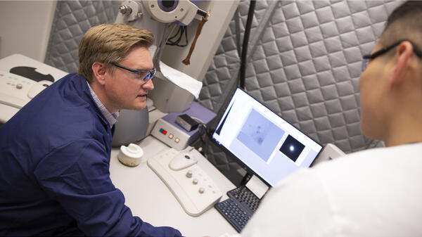 ASU Professor Brent Nannenga analyzes the composition of materials using an electron microscope.