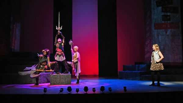 Actors performing on stage in "She Kills Monsters"