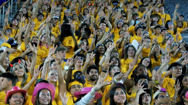 Crowd of students in gold t-shirts at Sun Devil Welcome