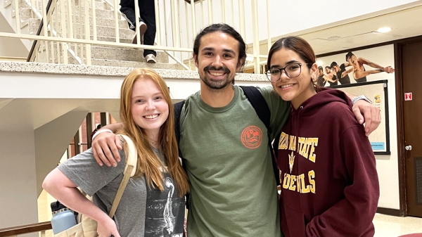 Three ASU students pose for a group photo.