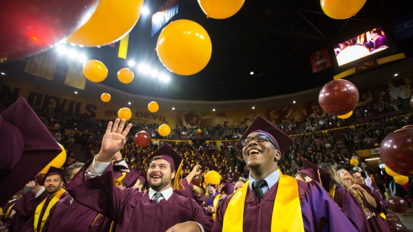 New graduates celebrate at the ASU undergraduate commencement.