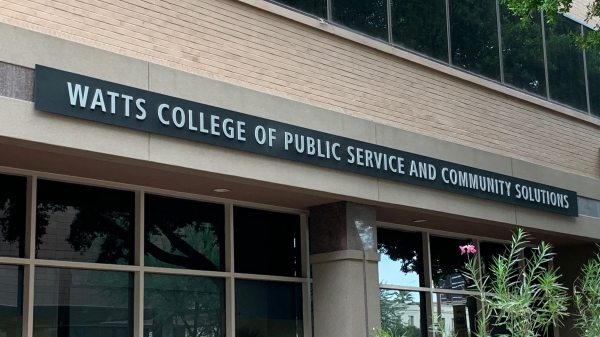 Exterior of a building with the words "Watts College of Public Service and Commnity Solutions."