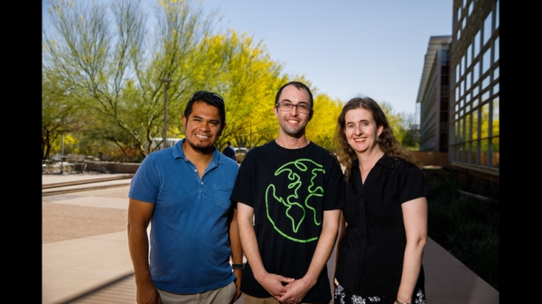 Researchers Hinsby Cadillo-Quiroz, Mark Reynolds and Rosa Krajmalnik-Brown pose for a group photo.