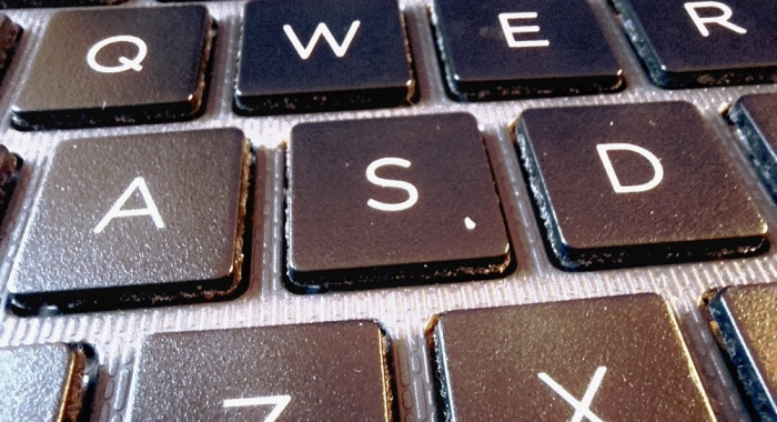 A close-up of keys on an HP laptop keyboard