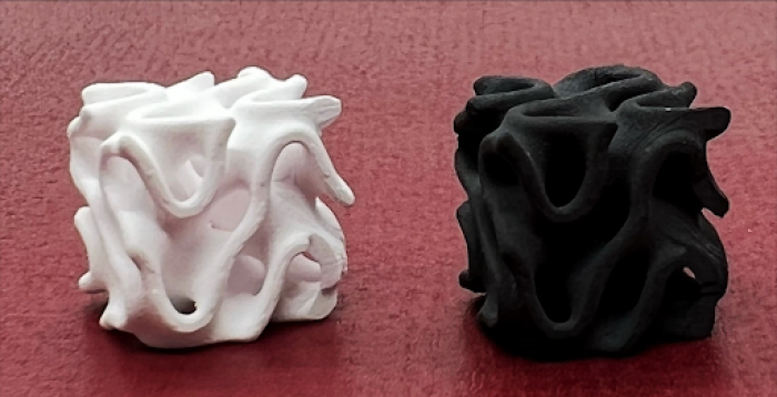 An image of examples of post-production, aluminum-based ceramic composite material.