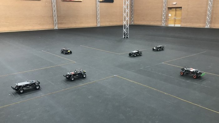 A test track with mini cars, simulating how full-size cars will behave