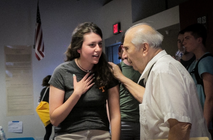 Gregory Melikian speaking with a Critical Languages Institute student in 2019.