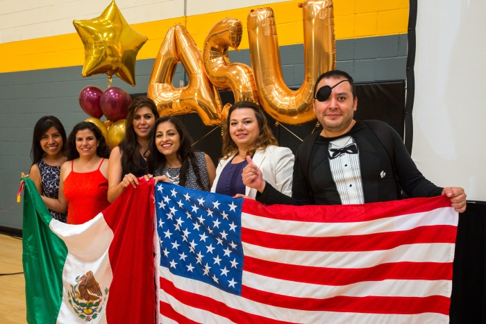 A group of people with an American flag