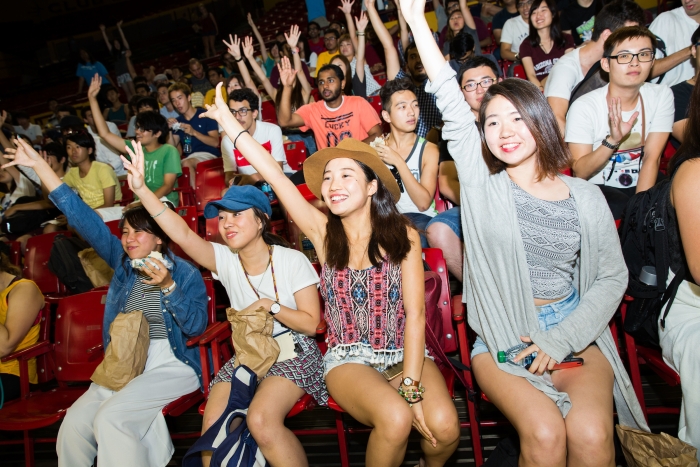 Students cheer at a football game