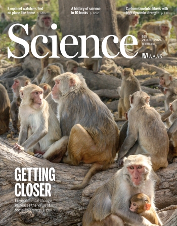 Cover of the journal Science featuring an image of macaque monkeys.