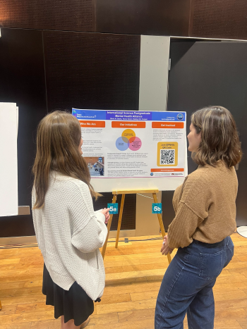 Olivia Davis, presenting a poster at the 2024 STEM Inclusion Summit on the ISPMHA