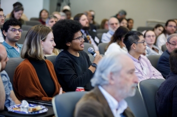 Portrait of audience at an event.