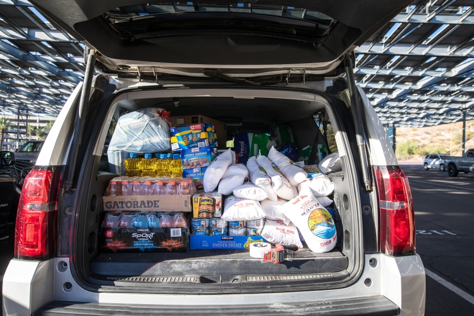 back of an SUV loaded with food donations