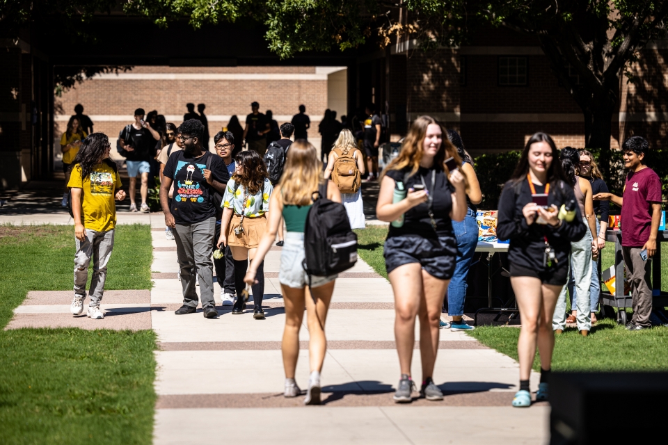Students walking on West campus mall
