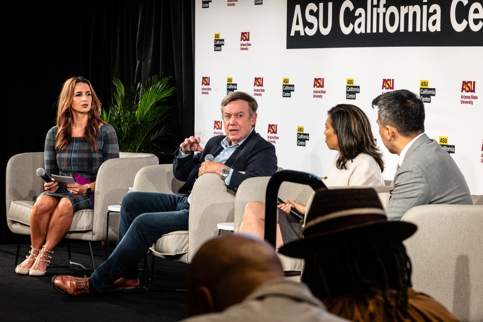 Four people on stage in chairs at ASU California Center event