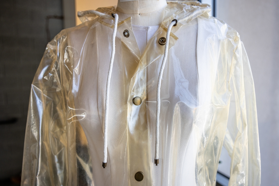 Transluscent raincoat on mannequin 