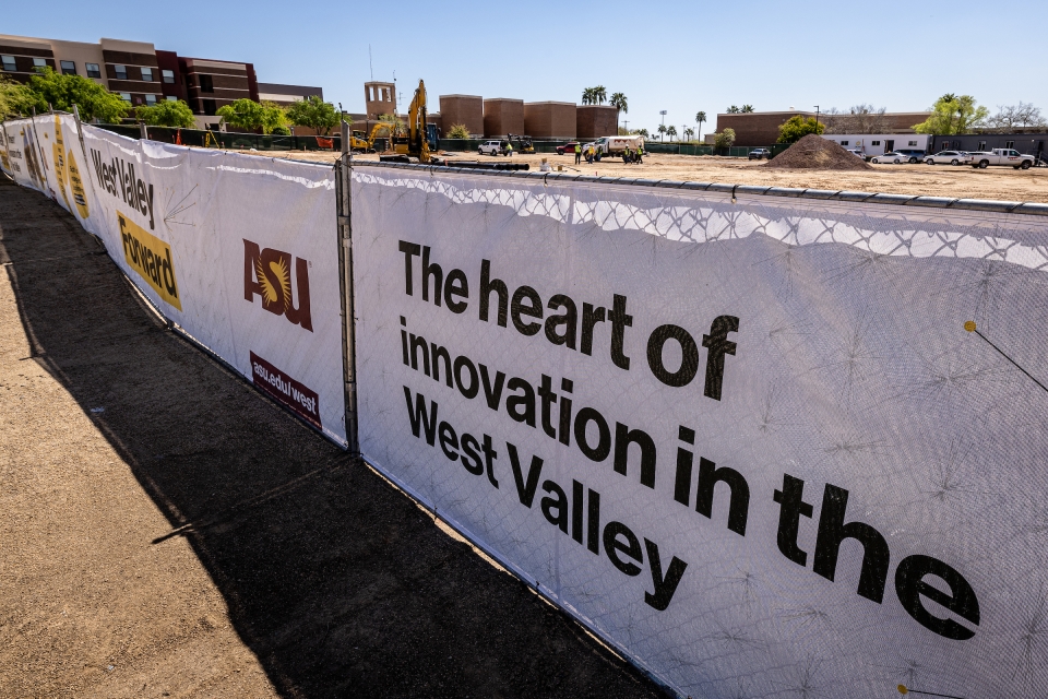 A fence around a construction zone reads: The heart of innovation in the West Valley