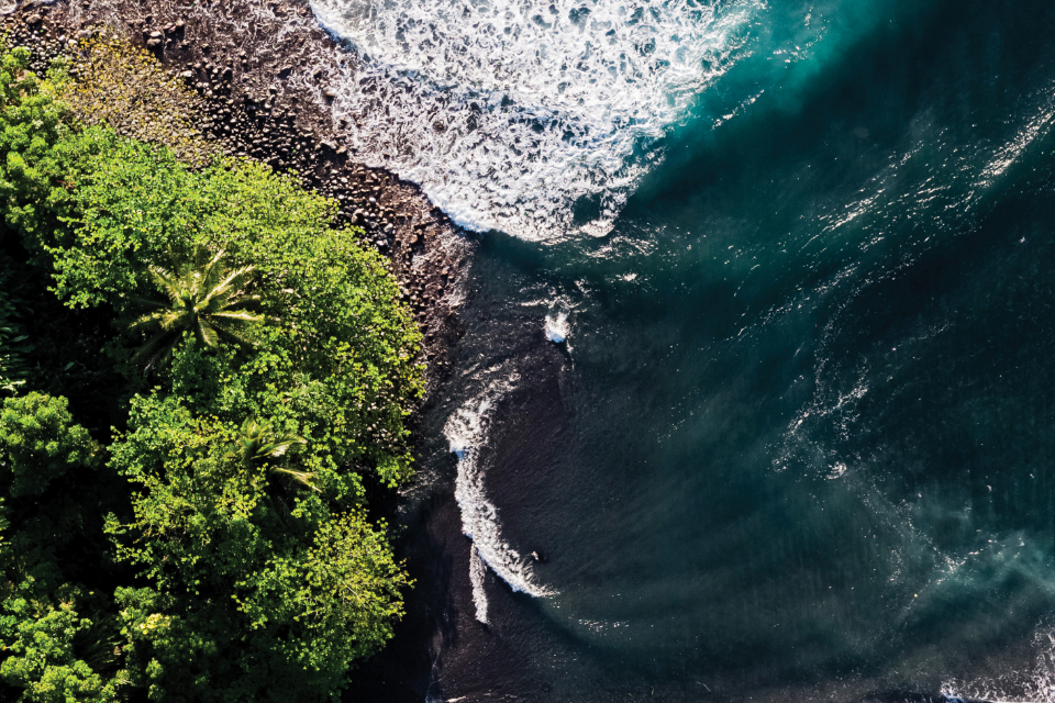 View of ocean and coastline in Hawaii from above