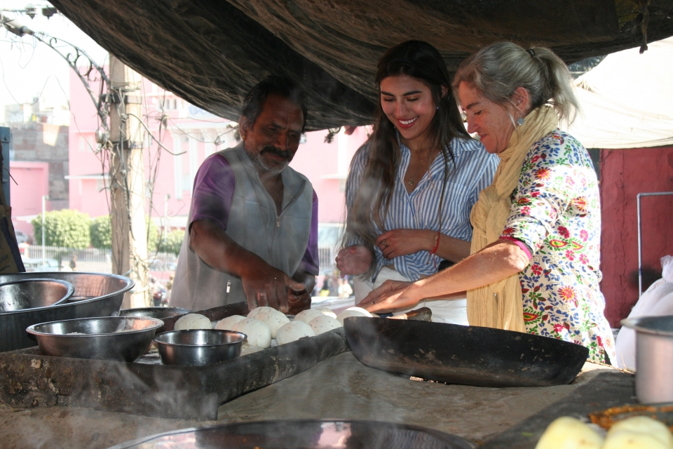 Ariana Afshari in the center with professor Susan Carrese in India