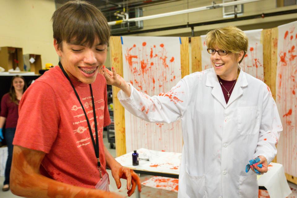People in a crime scene lab.