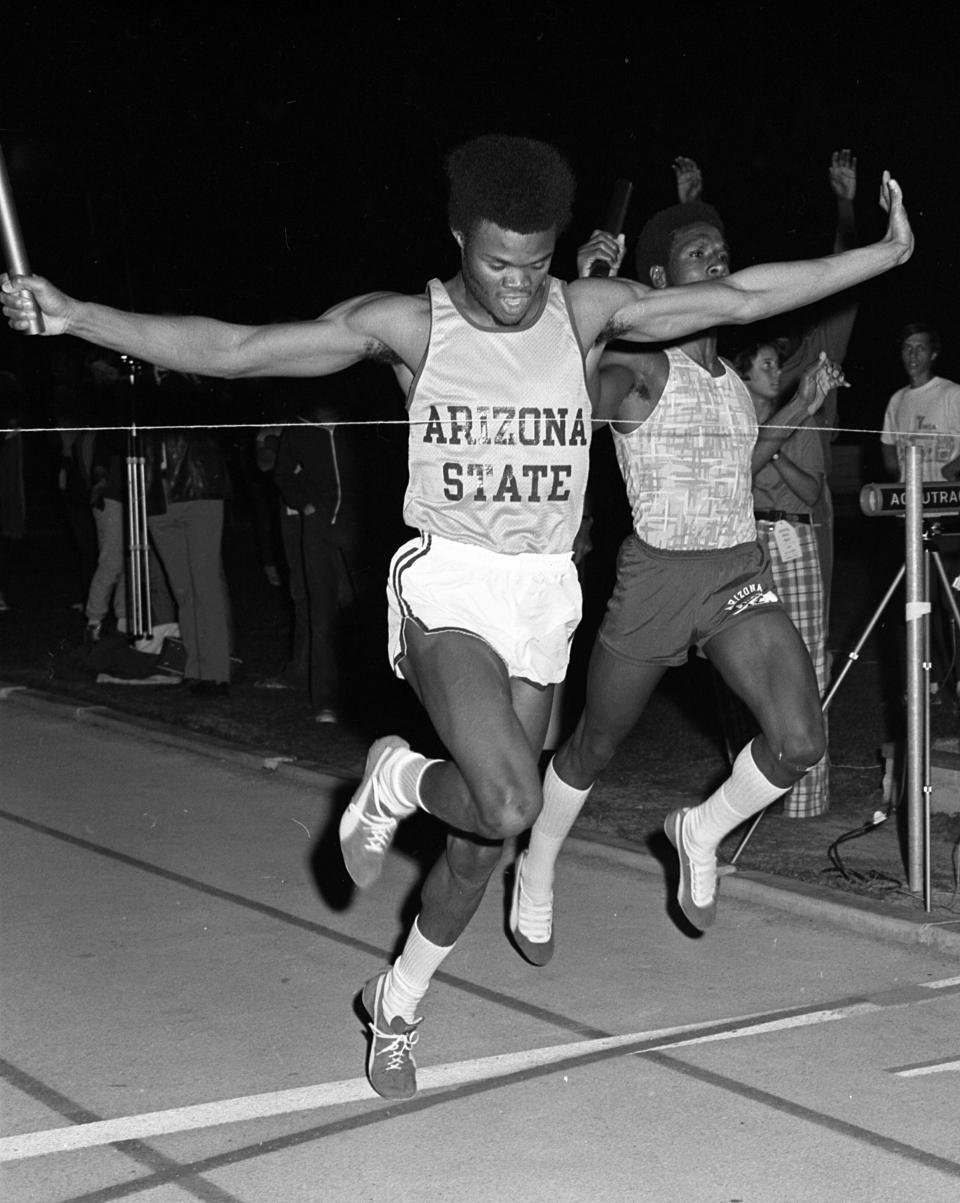 vintage photo of man crossing finish line