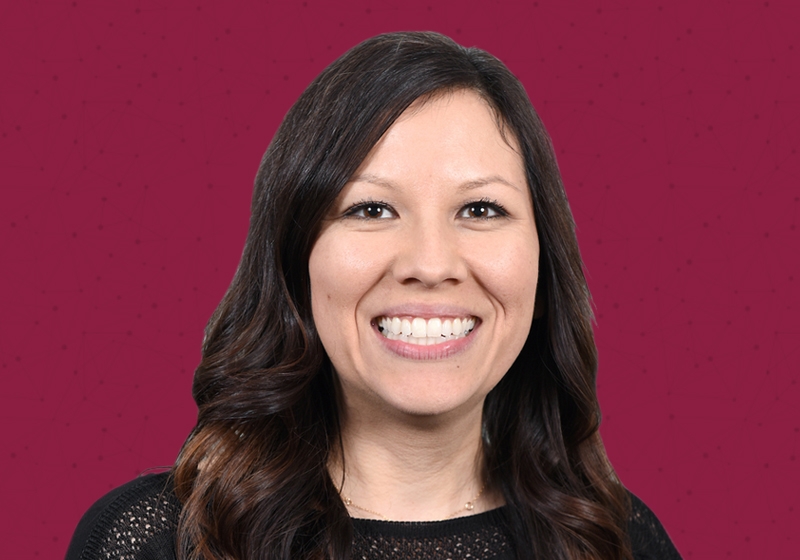 headshot of Bryce with maroon background