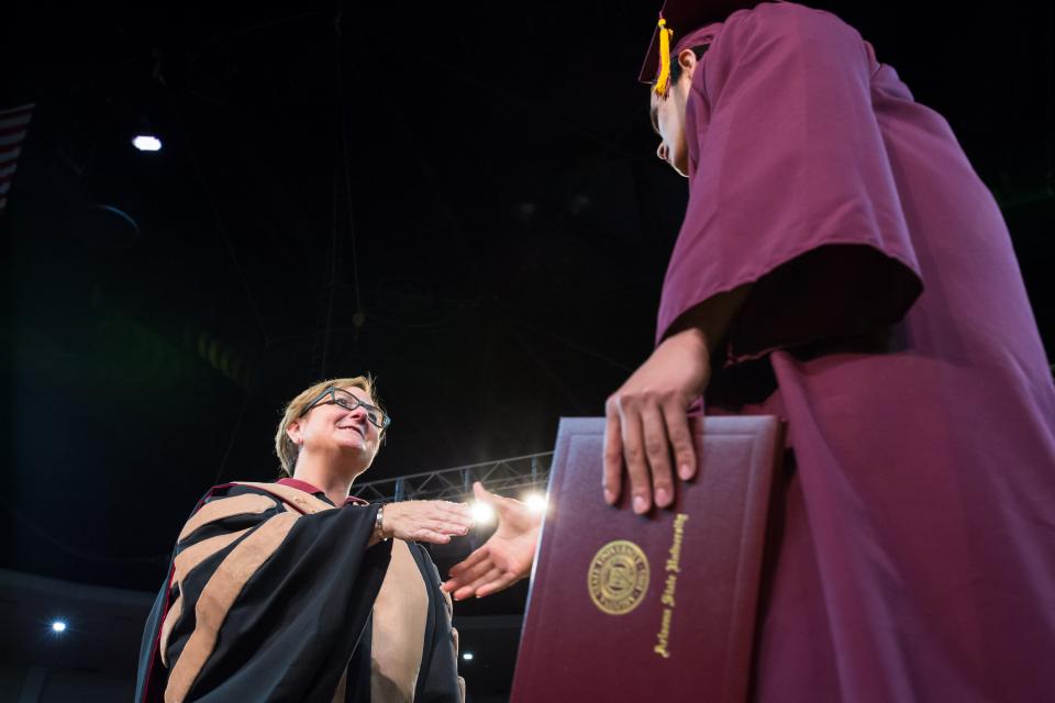 W.P. Carey School dean Amy Hillman congratulates graduates in 2015