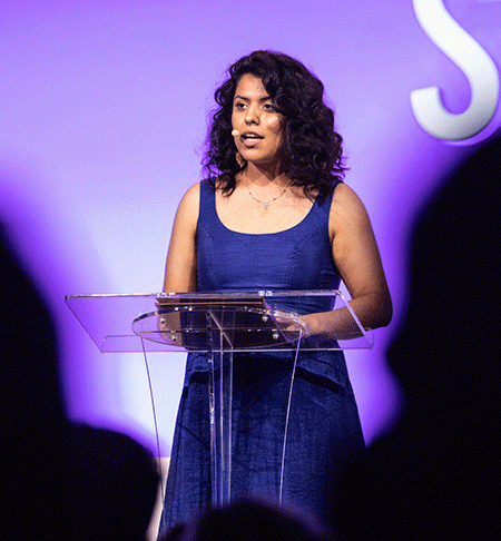 Andrea Mondragon-Rodríguez speaks on stage at the ASU GSV Summit